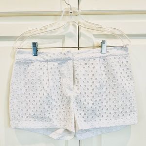 Large white dress shorts. NOT see through at all.